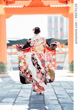 The back of a woman wearing a kimono 98878126