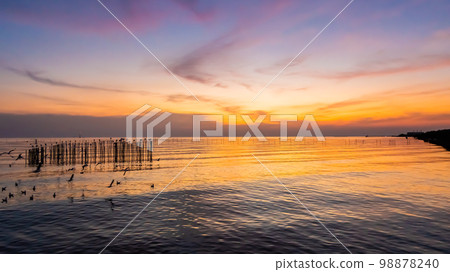 Landscape of sea coast during twilight time. Evening sunset. 98878240