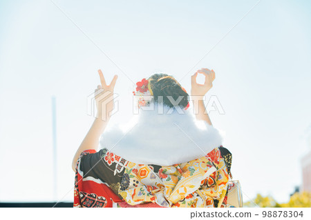 Back view of a young woman wearing a kimono 98878304