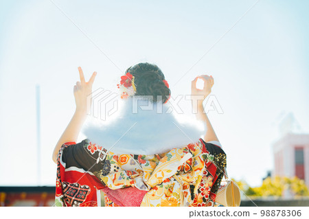 Back view of a young woman wearing a kimono 98878306