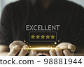 People give five stars satisfaction review on business by using smartphone. Online customer service feedback concept. 98881944