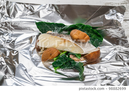 grilled cod in foil 98882699