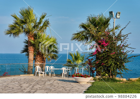 Sea coast, white stone cape in Kalymnos island or Governor Beach in Cyprus. Beach of the mediterranean sea surrounded by a picturesque nature. 98884226