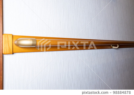 Corridor in an old house with handrails installed due to aging residents 98884878