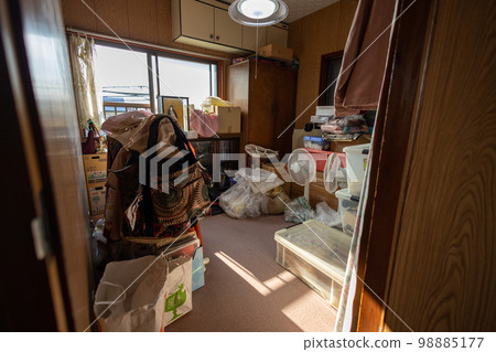 Storage room (closet) in an old house with lots of things Storage room (closet) in an old house with lots of things 98885177