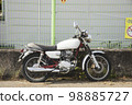 motorcycle parked on the side of the road 98885727