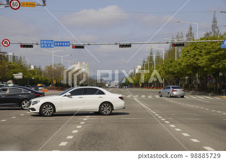 vehicle driving on the road 98885729