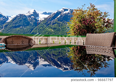 Reflexion of beautiful landscape near Hellesylt - Norway Reflexion of beautiful landscape near Hellesylt - Norway 98887797