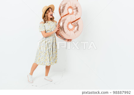 Full length portrait of happy pretty girl wearing dress Full length portrait of happy pretty girl wearing dress 98887992