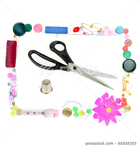 Scissors and other sewing accessories isolated on white . 98888305
