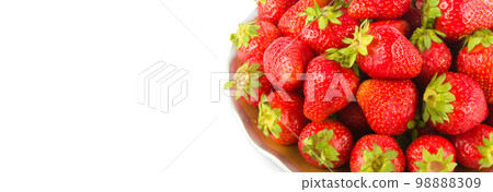 Ripe strawberries isolated on a white background. Wide photo. Free space for text. Ripe strawberries isolated on a white background. Wide photo. Free space for text. 98888309