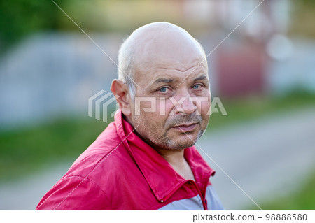 Sad bald European man in his 60s. Sad bald European man in his 60s. 98888580