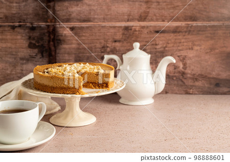 Birthday cake with burning candles, rustic wooden background, copy space. Birthday cake with burning candles, rustic wooden background, copy space. 98888601