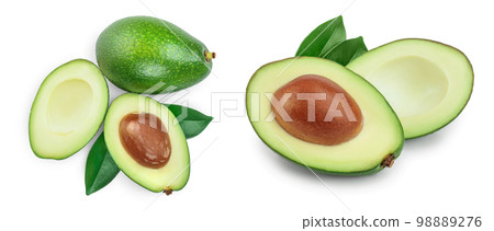 avocado and slices decorated with green leaves isolated on white background. Top view. Flat lay avocado and slices decorated with green leaves isolated on white background. Top view. Flat lay 98889276