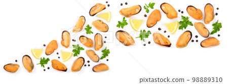 mussels with parsley lemon and peppercorns isolated on white background. Top view. Flat lay mussels with parsley lemon and peppercorns isolated on white background. Top view. Flat lay 98889310