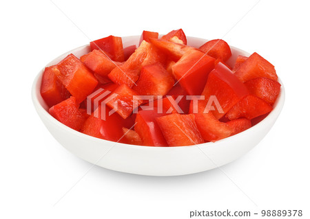 slices of red sweet bell pepper in ceramic bowl isolated on white background with full depth of field 98889378