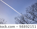 contrails in the sky 98892151
