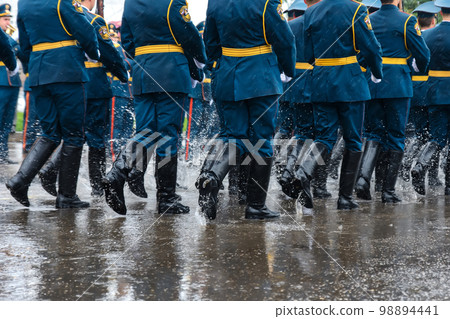 feet of the Russian military in boots marching on march 98894441