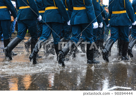 feet of the Russian military in boots marching on march 98894444