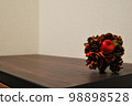 Pine cone and apple ornament 98898528