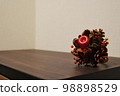 Pine cone and apple ornament 98898529