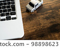 A laptop with the image of a logistics business 98898623