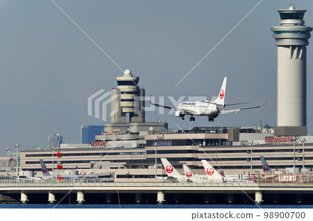 Aircraft landing at the airport Aircraft landing at the airport 98900700
