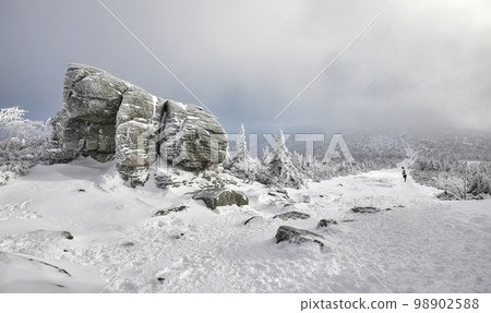 Winter mountain landscape with snow covered path, Karkonosze Mountains, Poland. Winter mountain landscape with snow covered path, Karkonosze Mountains, Poland. 98902588