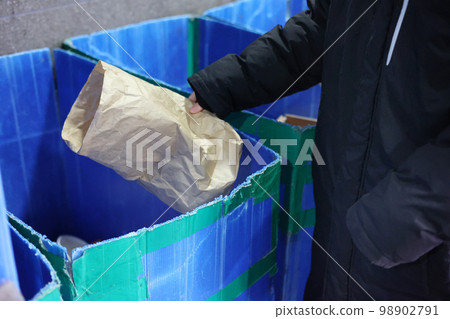 Person who separates paper boxes Person who separates paper boxes 98902791