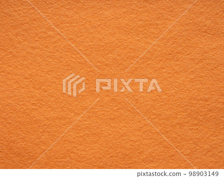 Orange felt texture. Saturated background for Christmas desktop, holiday New Year, xmas seasonal decoration, valentin day, text, lettering, patchwork or, party greeting and wedding card element. Orange felt texture. Saturated background for Christmas desktop, holiday New Year, xmas seasonal decoration, valentin day, text, lettering, patchwork or, party greeting and wedding card element. 98903149
