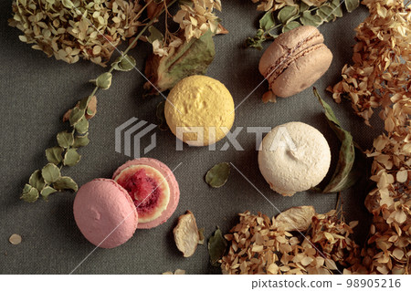 Macaroons with dried flowers. 98905216