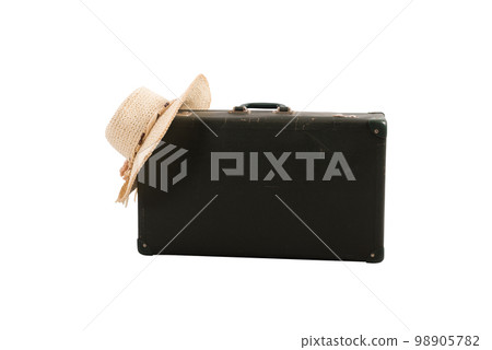 Isolated suitcase with woman hat ready for the summer 98905782