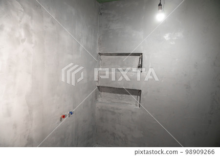 room with plastered walls on the construction site room with plastered walls on the construction site 98909266