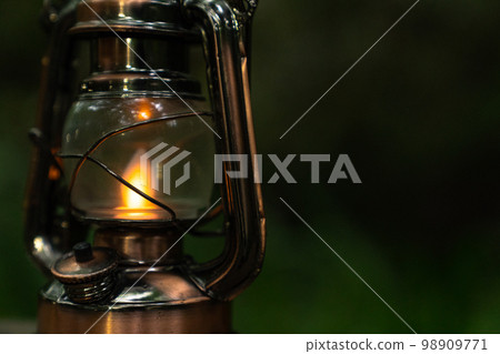 antique lantern in the woods 98909771