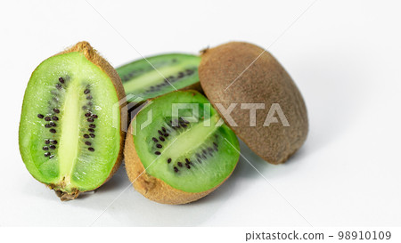 Closeup, kiwi on a white background isolated. Closeup, kiwi on a white background isolated. 98910109