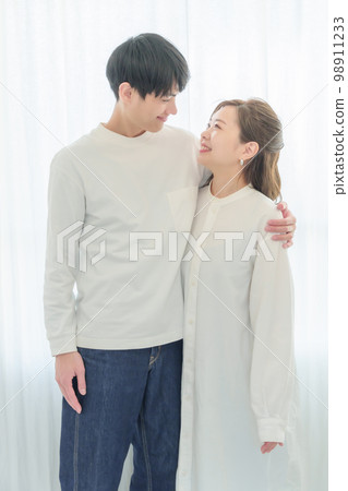 A couple staring at each other Vertical A couple staring at each other Vertical 98911233