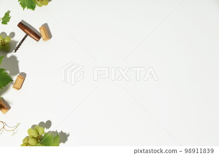 Wine composition on white background top view copy space Wine composition on white background top view copy space 98911839
