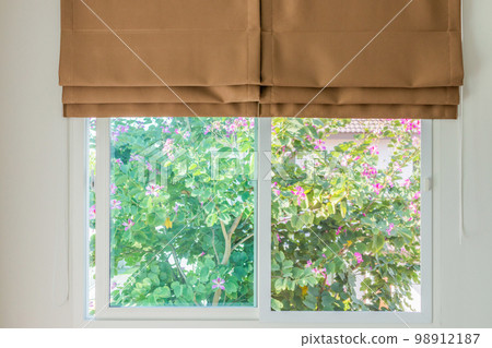 Roman blind curtain decoration in living room interior Roman blind curtain decoration in living room interior 98912187