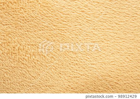 yellow fluffy fur fabric wool texture background 98912429