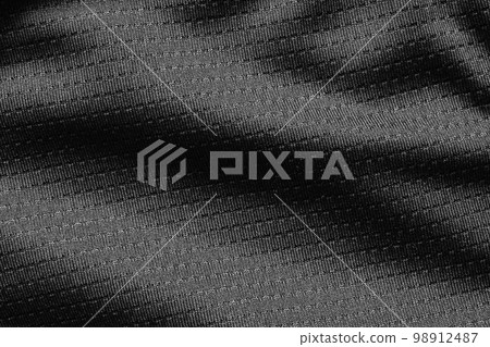 Black sport cloth fabric football shirt jersey texture close up Black sport cloth fabric football shirt jersey texture close up 98912487