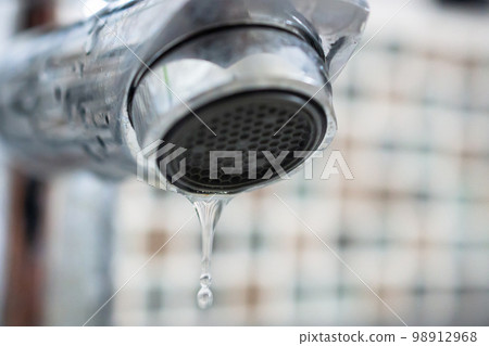 Close up faucet with water drop Close up faucet with water drop 98912968