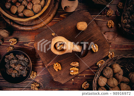 Flat lay of freshly cracked walnut Flat lay of freshly cracked walnut 98916972