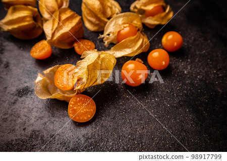 Yellow physalis fruits 98917799