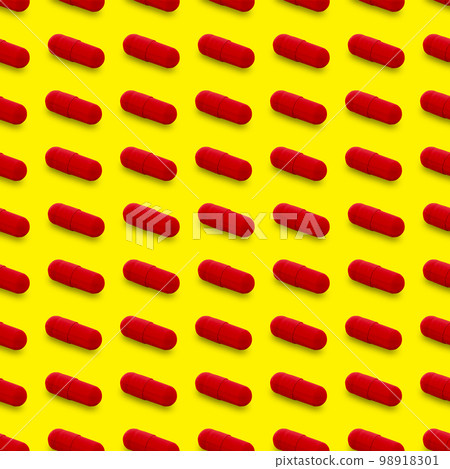 Gel capsule seamless pattern. Red capsule drug, pharmacy concept. food supplement, on yellow Gel capsule seamless pattern. Red capsule drug, pharmacy concept. food supplement, on yellow 98918301
