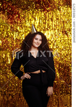 Girl with a curly hairstyle Girl with a curly hairstyle 98918573