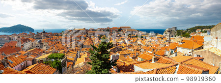 Panorama Dubrovnik Old Town roofs. Tourist attraction. Europe, Croatia Panorama Dubrovnik Old Town roofs. Tourist attraction. Europe, Croatia 98919360
