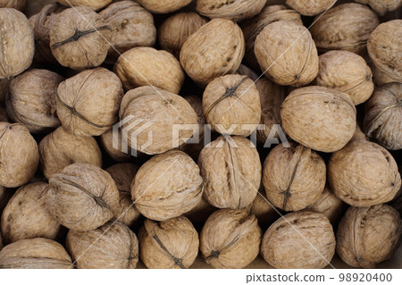 English walnuts background English walnuts background 98920400