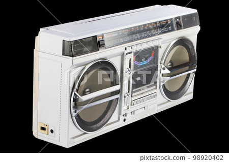 Retro vintage portable stereo boombox radio cassette recorder from 80s isolated on black ground. 98920402