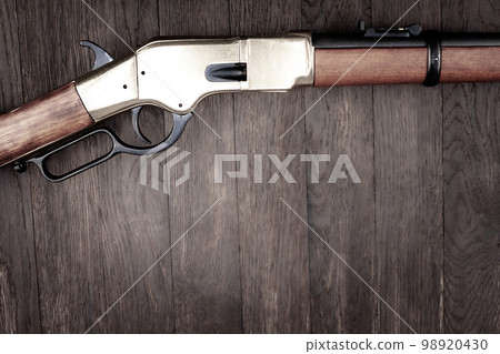 Old west gun - lever-action repeating rifle. 98920430