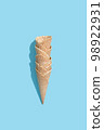 Ice cream cone on color background 98922931